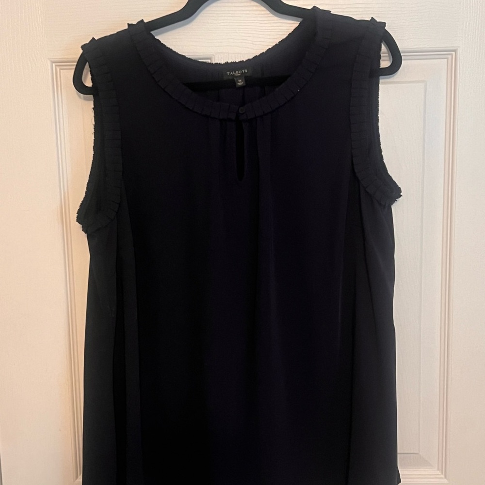 Navy blue top with detailed neck and sleeve